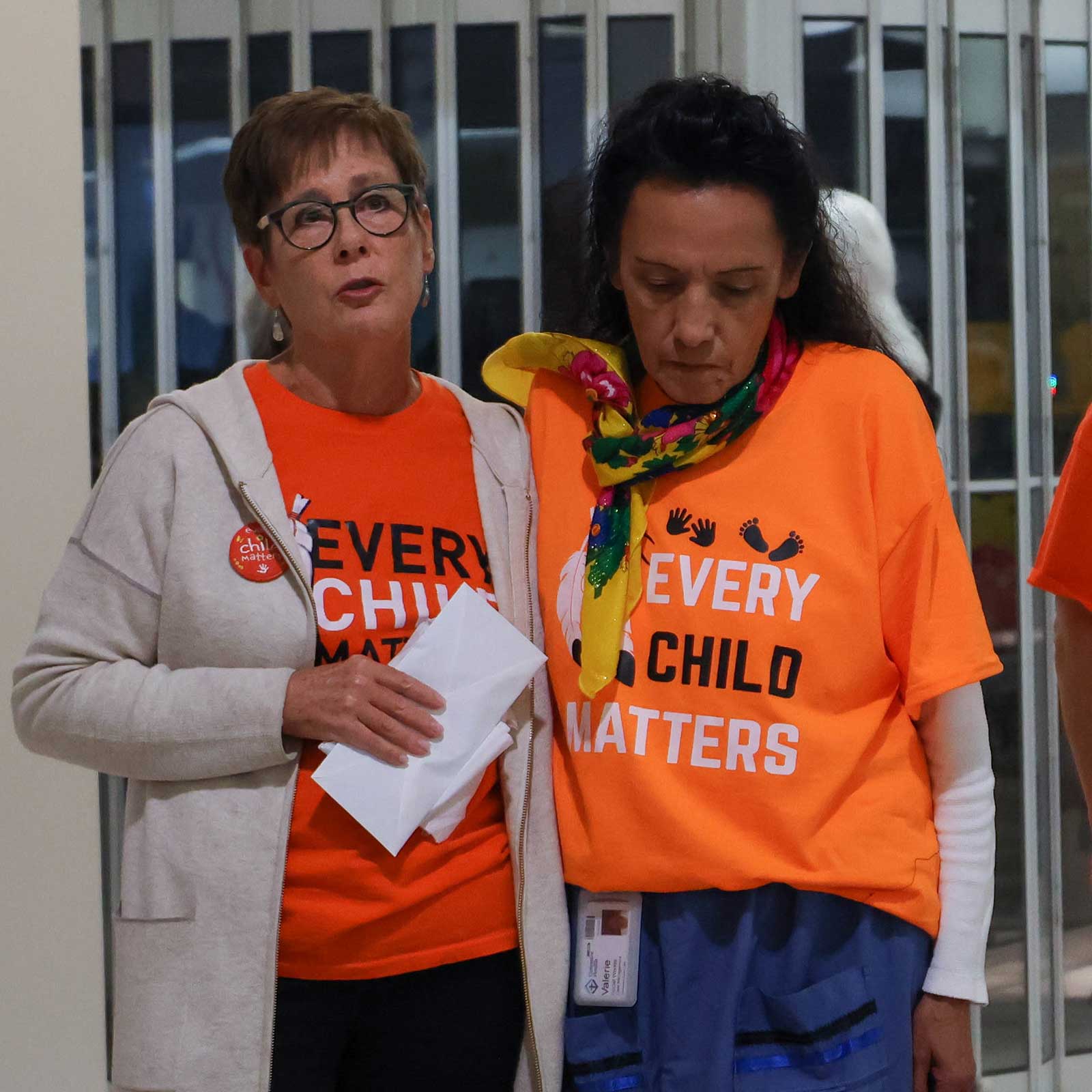 Two Covenant Health colleagues wear orange shirts in recognition of the National Day for Truth and Reconciliation