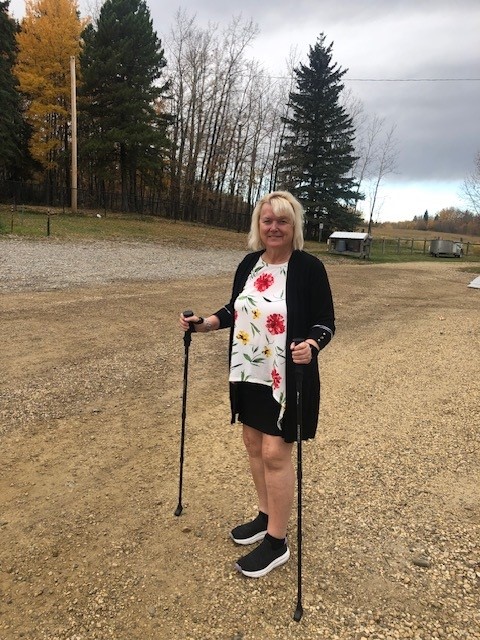 Brenda Turner takes a walk following robotic-assisted surgery.