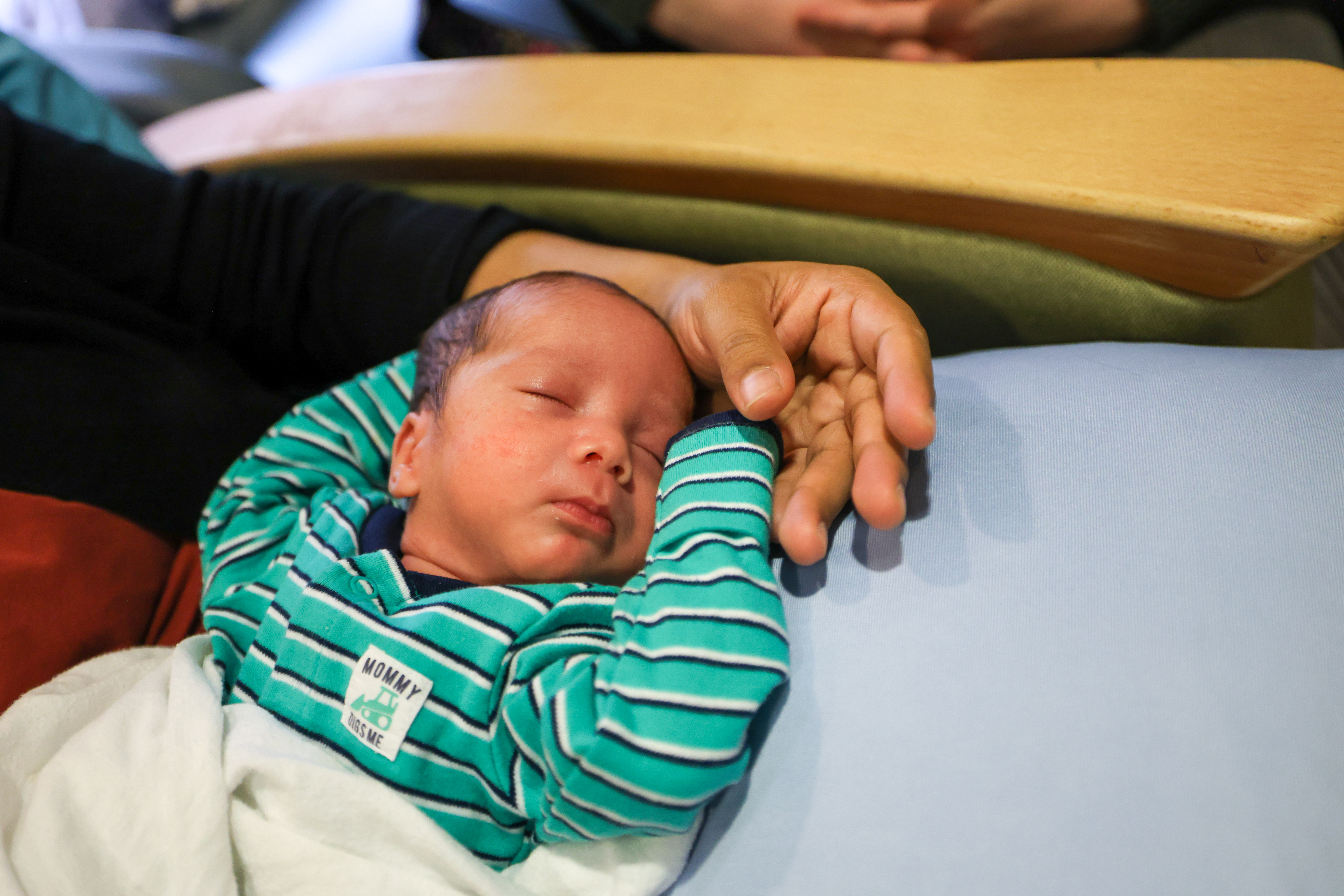 Alejandra Amores is soothed by music during his stay on the neonatal intensive care unit at the Grey Nuns hospital.