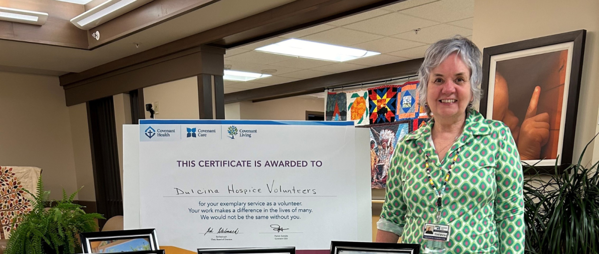 Theresa Bellows stands in the foyer of Dulcina Hospice where she is a volunteer co-ordinator.