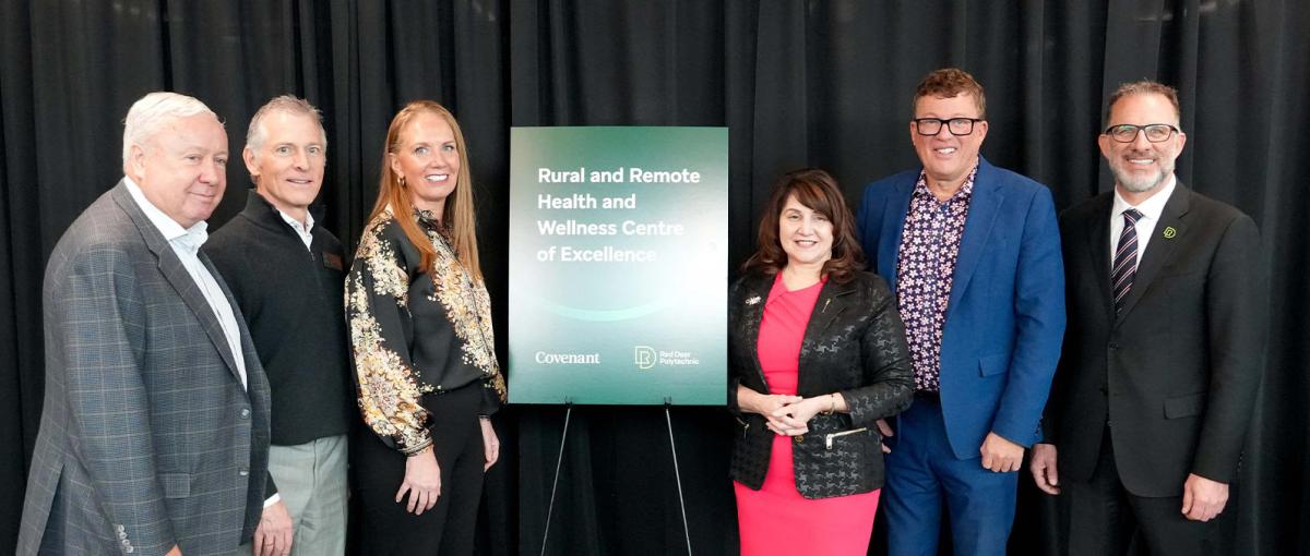 Officials from Covenant, Red Deer Polytechnic and the Alberta government pose after signing agreement to create new Rural and Remote Health and Wellness Centre of Excellence.