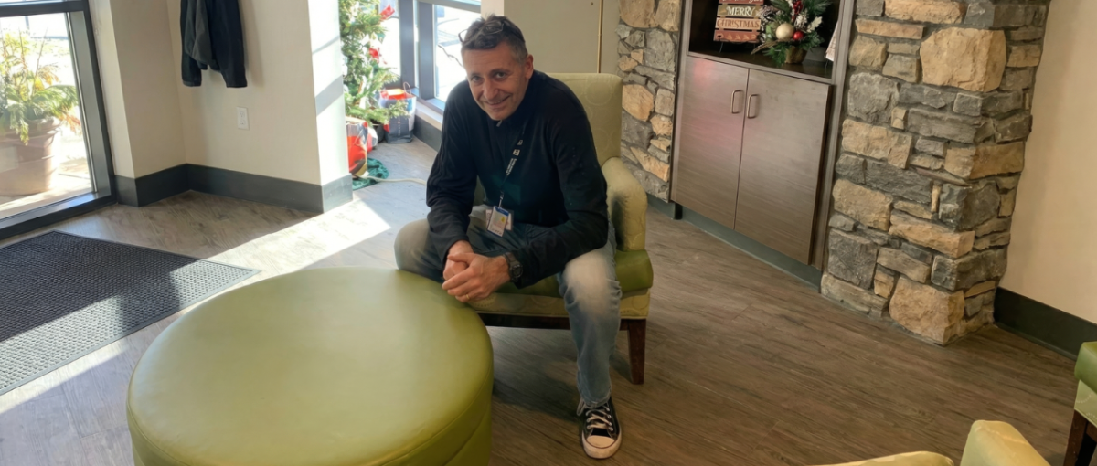 Greg Kern, chaplain at St. Teresa Place in Calgary, poses in the common area.