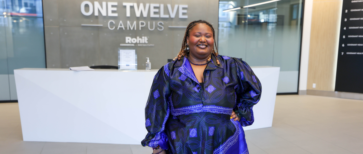 Karis Nsofor, diversity, equity, inclusion and belonging consultant at Covenant Health, poses at One Twelve Campus.
