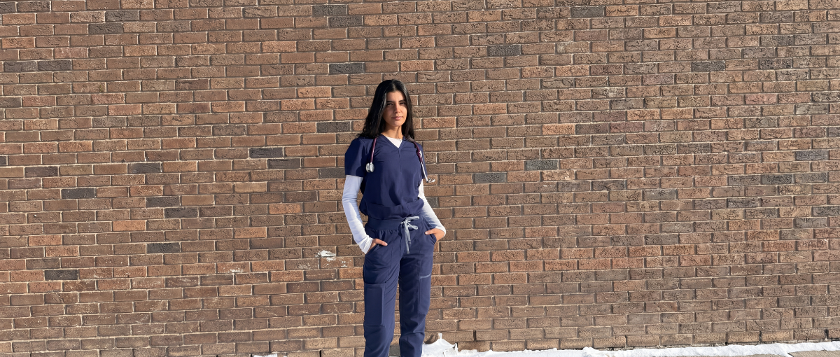 Aksa Jacob, a graduate nurse, stands outside Bonnyville Health Centre.