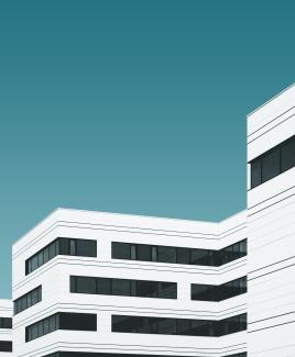 white buildings in front of blue sky