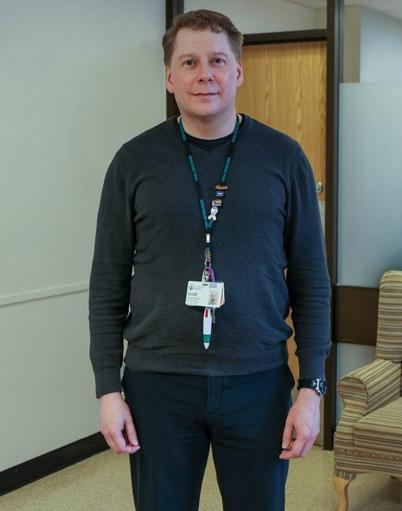 Scott Stwart stands in the Edmonton General where he works.