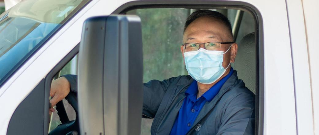 Sam Leong A photo of same in the driver's seat of his transport van.