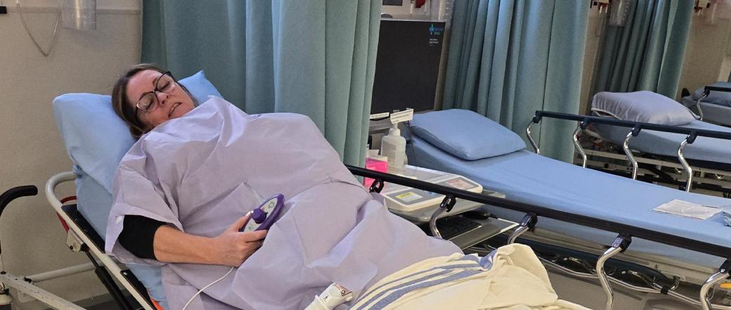 Patient wears warming gown during surgery to reduce infection 