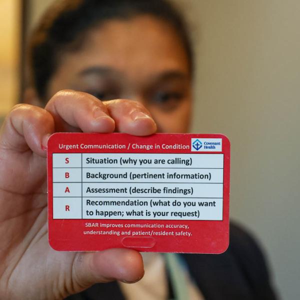A SBAR card being held up