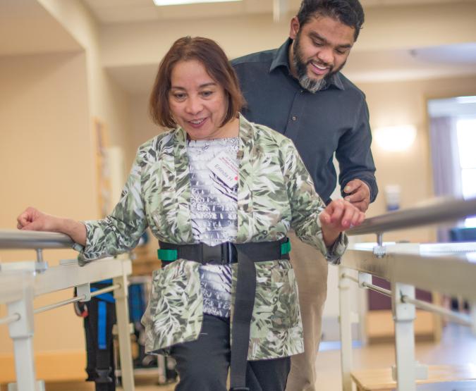 Hiring rehabilitation medicine practitioners A physiotherapist helps a patient during rehab exercises.